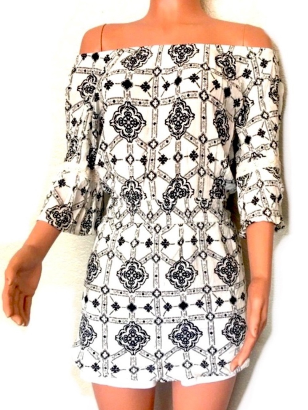 Flying Tomato Black and White Patterned Garment with Coral Logo